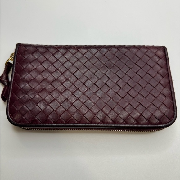 Bottega Veneta Handbags - Eggplant wine color Bottega Veneta Intrecciato Leather Zip Around Wallet
